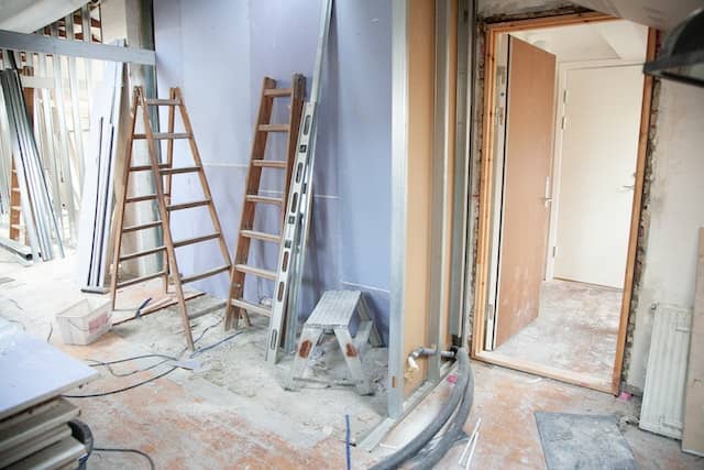 In the middle of Remodeling bathroom project with supplies and ladders everywhere. Bathroom Remodeling company charlotte