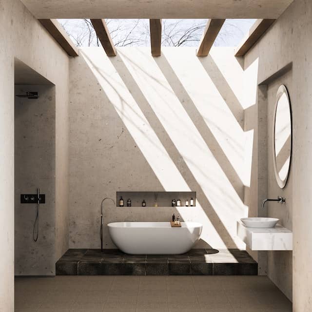 Modern bathroom remodeled, showing tub and stone work.