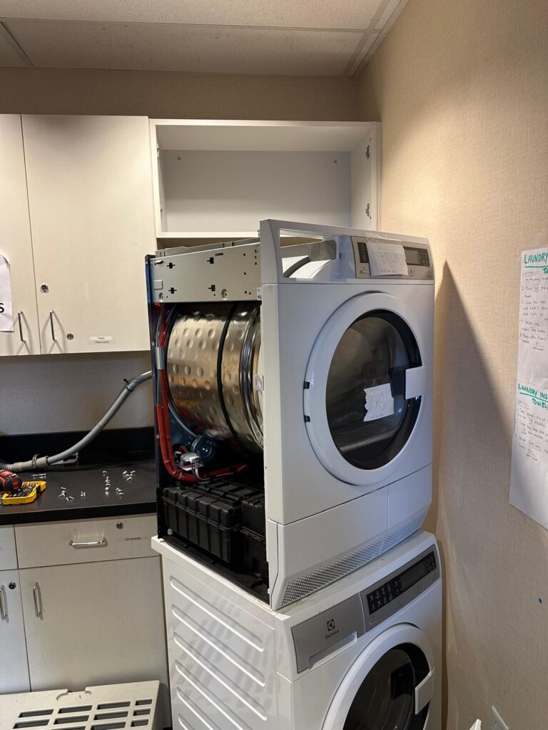 appliance repair team fixing electrical issues 768x1024