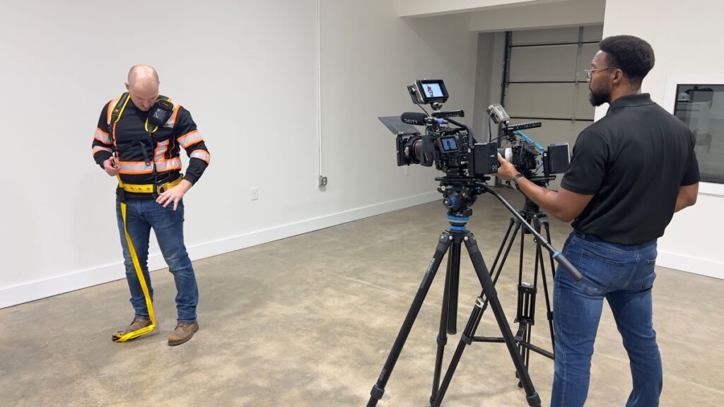 Final Cut Multimedia cameraman filming on set.